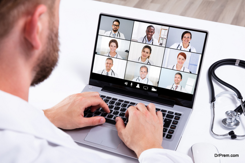 Doctor Having Video Conference On Laptop