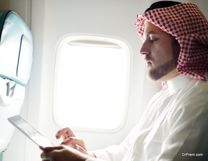 Arabic man inside airplane