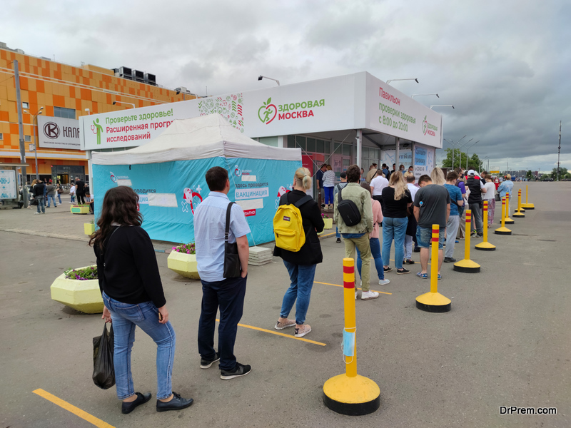 People waits in line for free coronavirus vaccination Russia