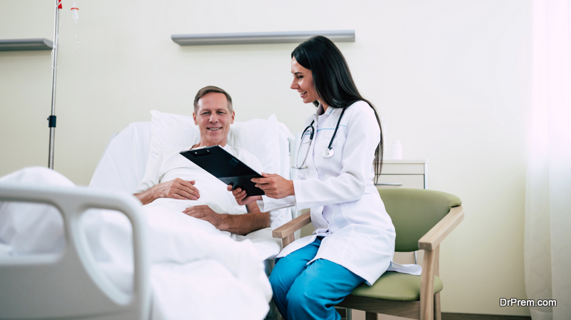 skilled indian doctor talking to patient