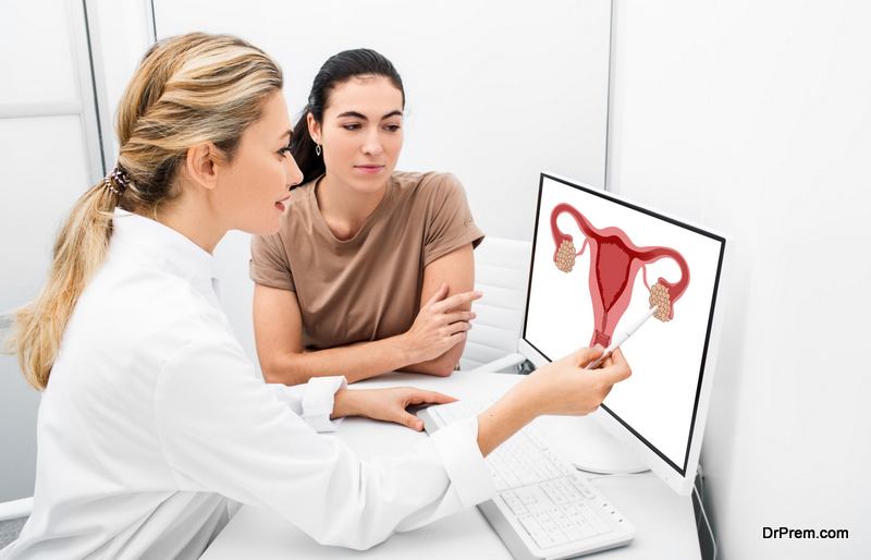 Gynecologist consulting a woman patient, talking about diseases 