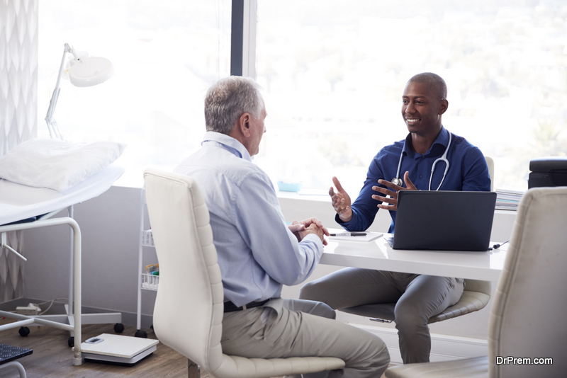 Senior Male Patient In Consultation With Doctor 