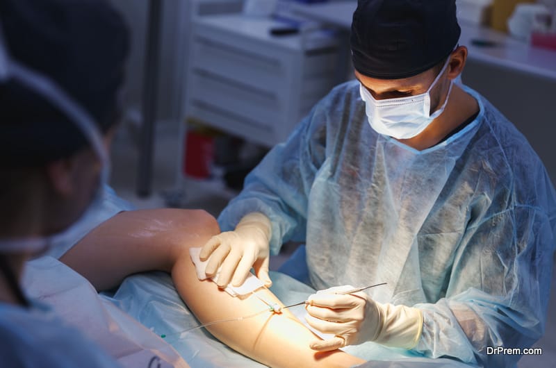 doctor and an assistant in operating room for surgical clinic