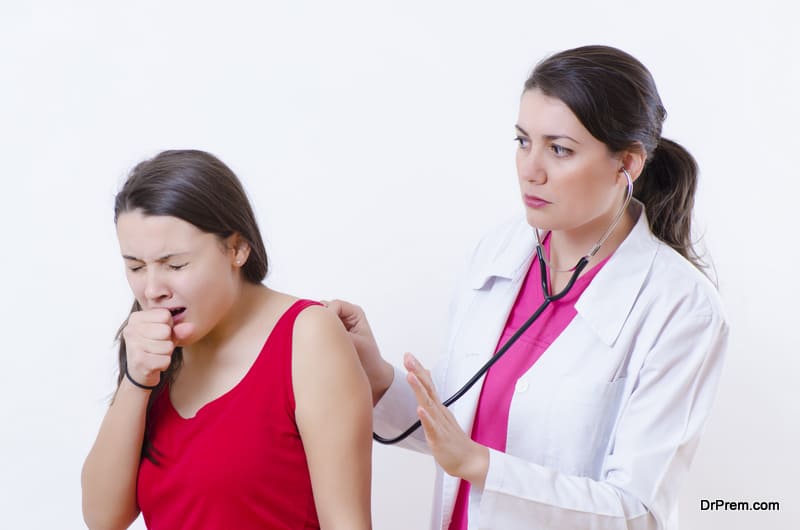 A female doctor consulting a patient with a stethoscope