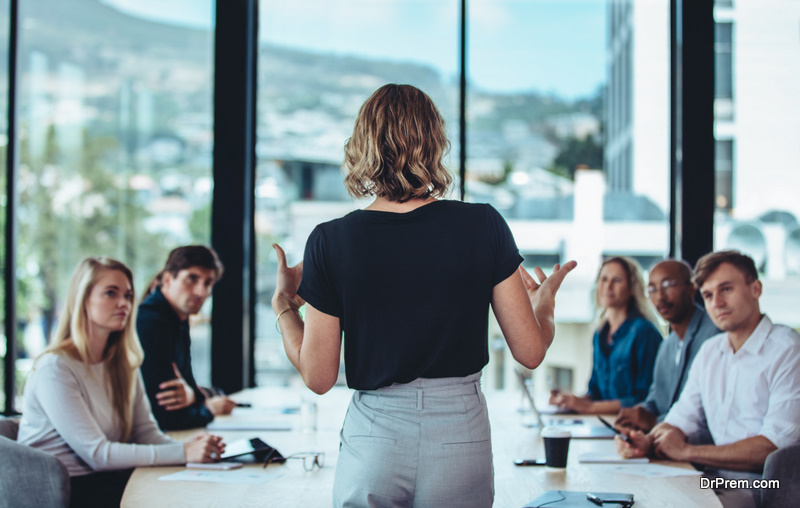 Businesswoman sharing new ideas in meeting