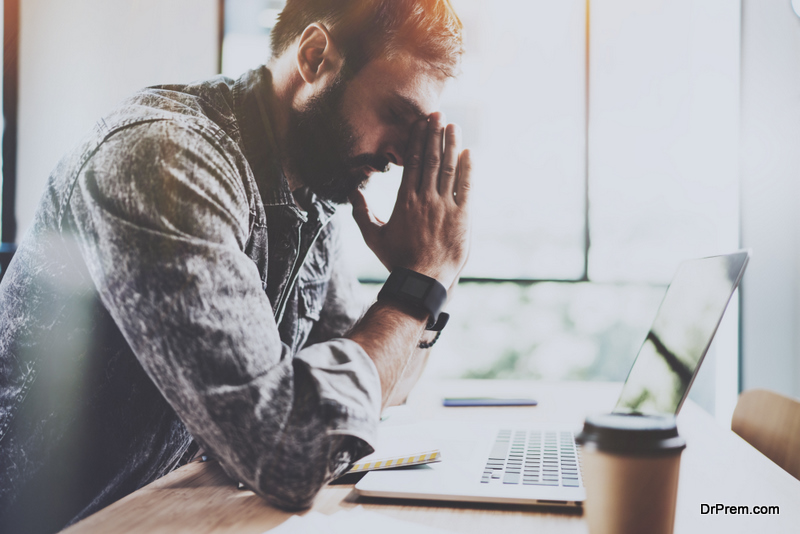 stressed-young-bearded-man