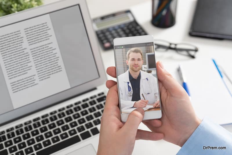 Doctor with a stethoscope on the smartphon