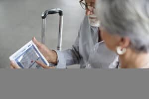 The Death of Paper Consent: AI Rewrites Patient Trust in Medical Tourism senior couple traveling airport scene