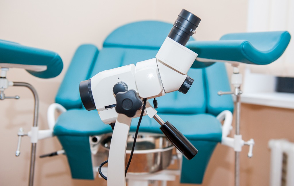 Close-up-Colposcope-on-the-Background-of-gynecological-chair-picture-id903037318