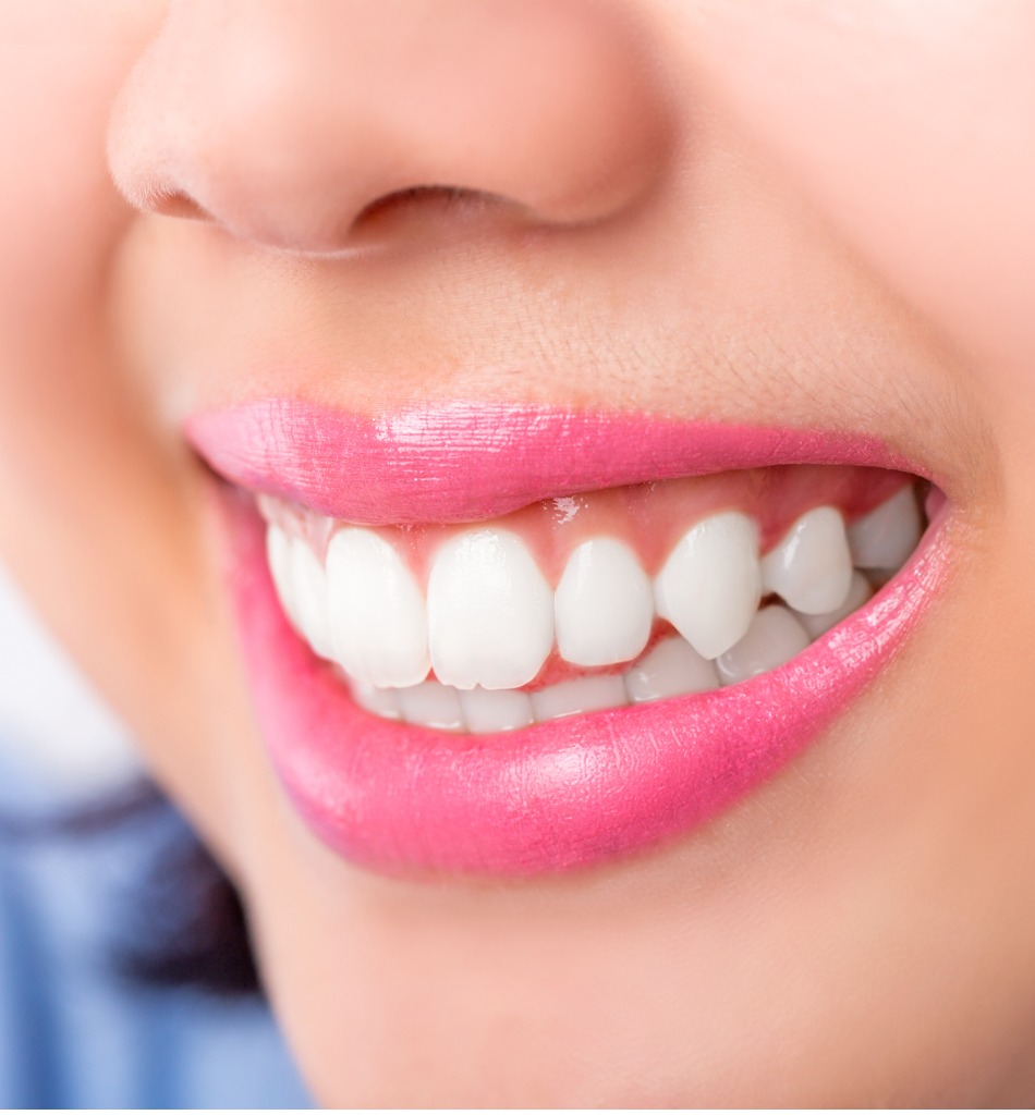 Close-up-young-woman-smiling-white-