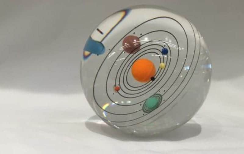 Paperweight with a solar system