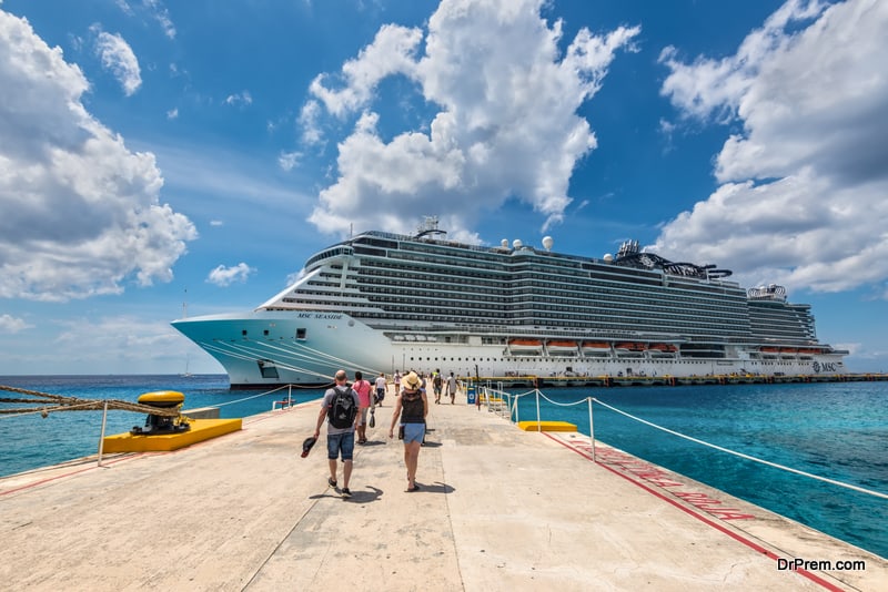 Cruise passengers arrive to the cruise ship