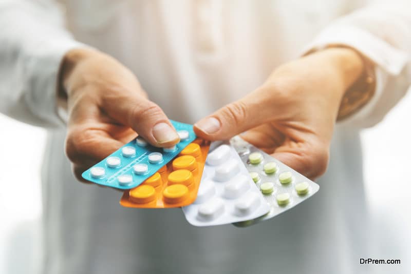 woman hands holding medicines