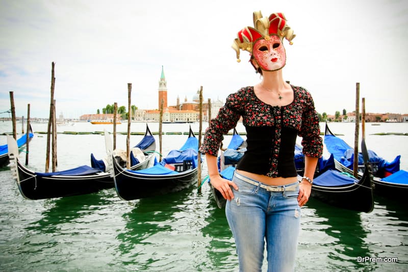 Girl in carnival mask in Venice