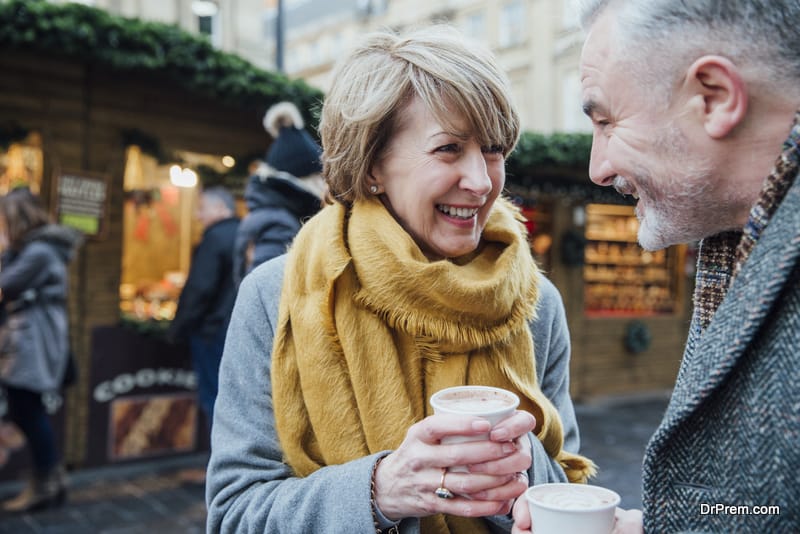 Mature couple are enjoying a cup of coffee