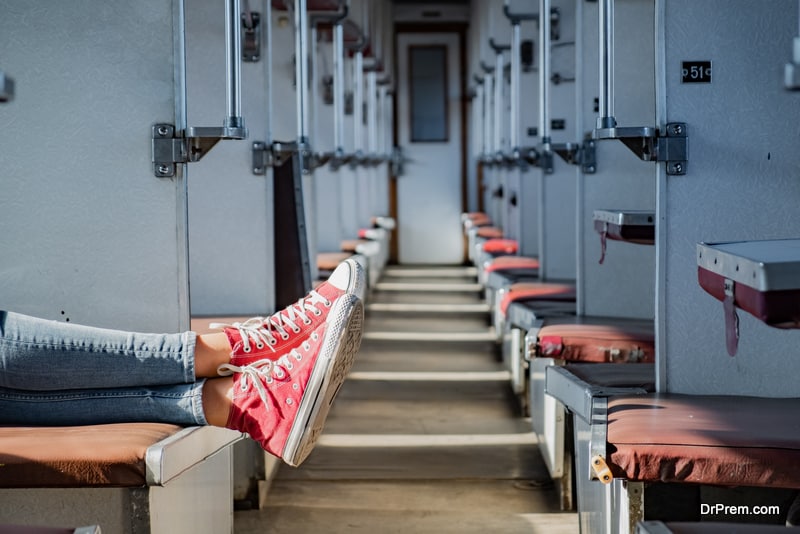 lady sleeping in train compartment