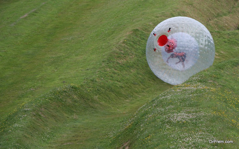 Zorb rolling down the hill