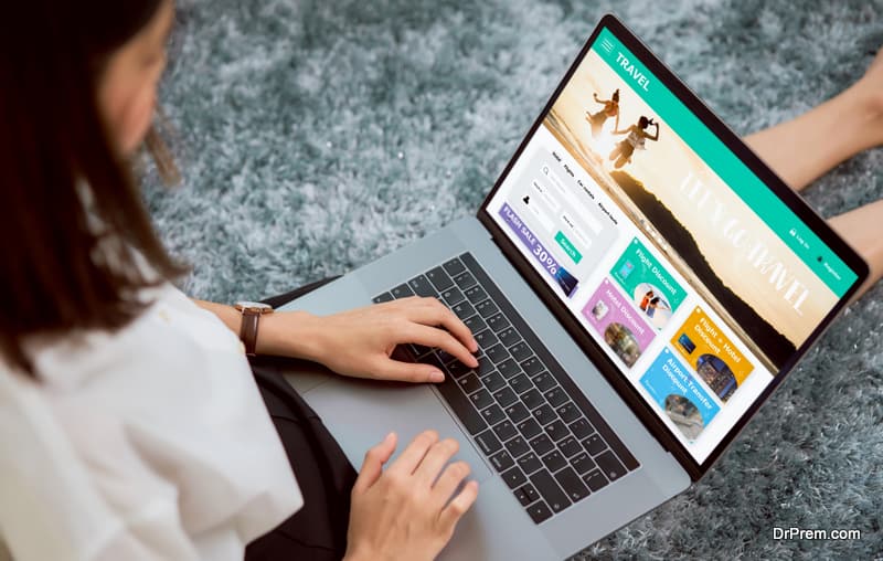 woman sitting in her house with using laptop 