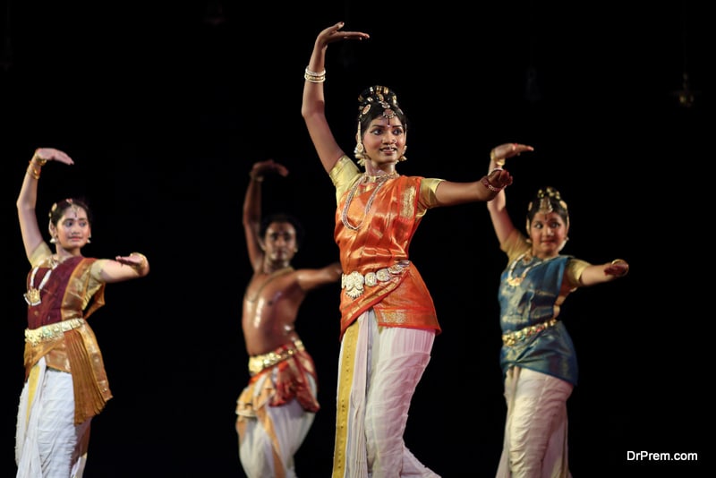 Unknown dancers performing kuchipudi in an event