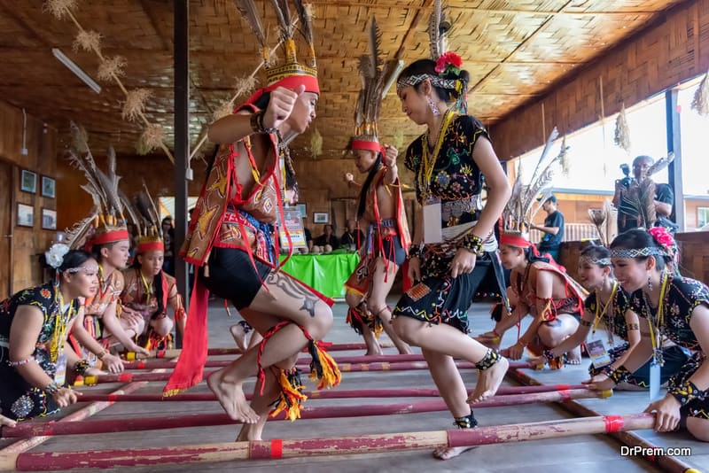 Sabah Borneo Magunatip bamboo dancing performance - Dr Prem Travel ...