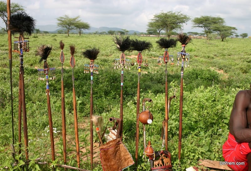 Samburu Chief sells weapons at his shop, Kenya, Africa