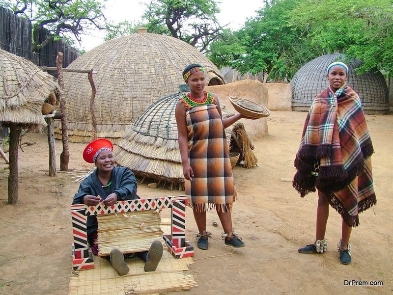 Unidentified Zulu women in traditional Zulu clothing at Shakaland Zulu Cultural Village