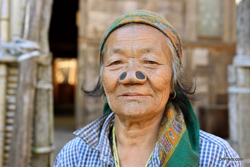 Ziro valley, Arunachal Pradesh, India Old Apatani woman with tribal face tattoo