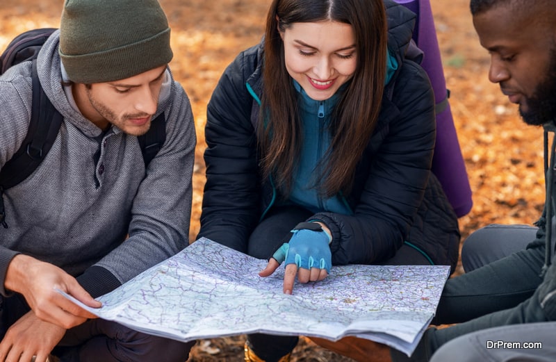 female tour guide instructing travellers