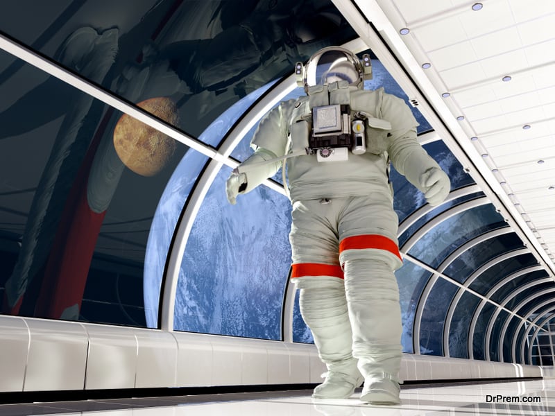 Astronaut in the tunnels of the spacecraft.Elemen ts of this image furnished by NASA