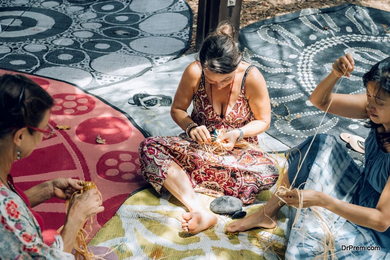 Females-weaving-baskets-on-craft-workshop