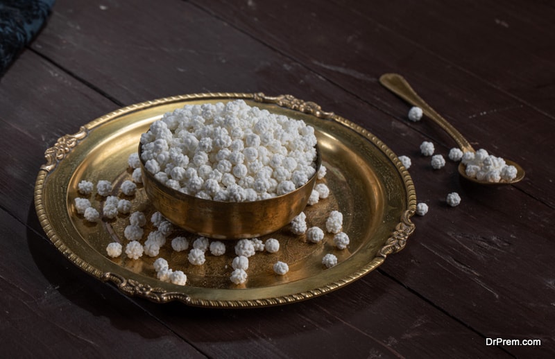 Heap of Makana or Ram Dana sugar coated sweet food item use as prasad in temples of india