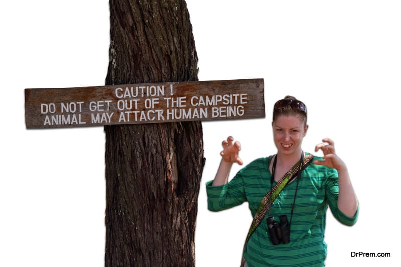 Scary Woman Next to Danger Sign