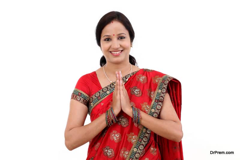 Traditional Indian woman woman greeting Namaste 