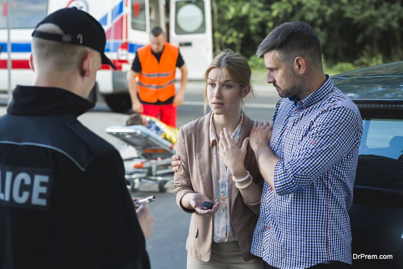 couple talking to the cop