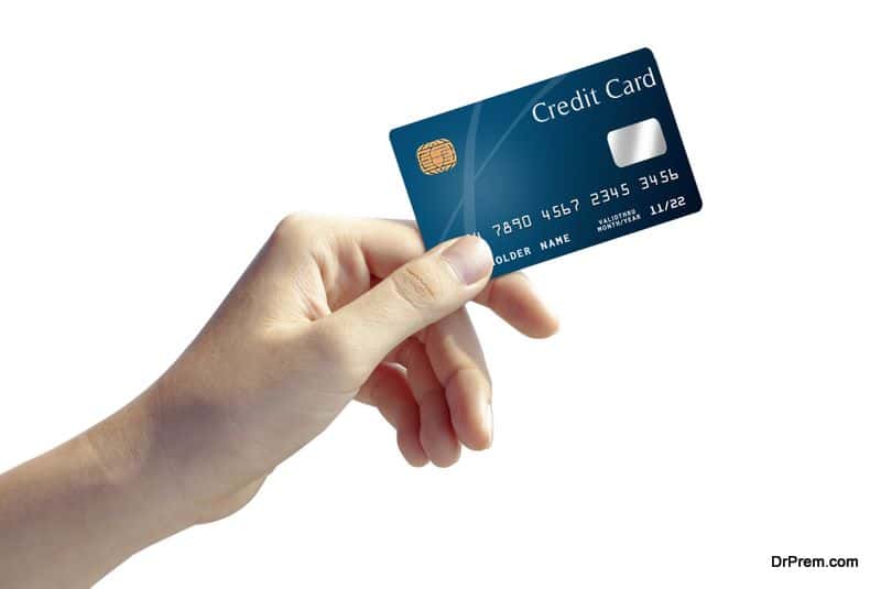 hand holding credit card