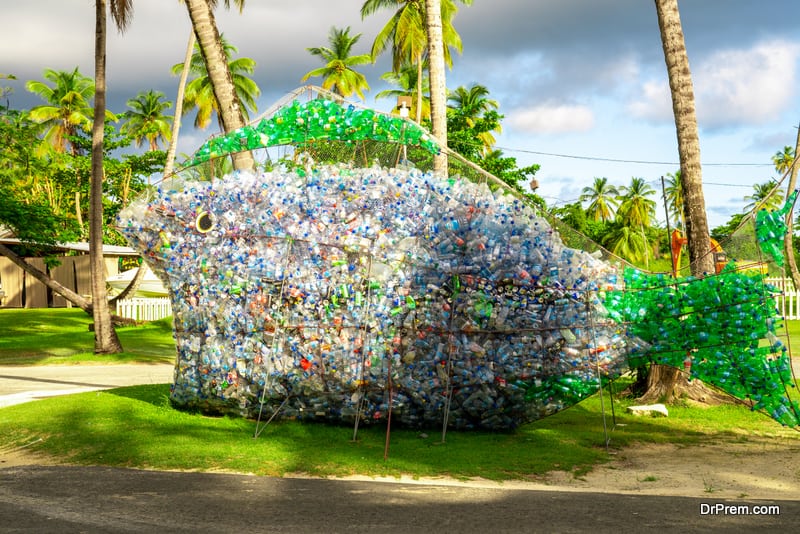 Huge white and blue public fish sculptures made from plastic drinking water bottles on the island of Tobago