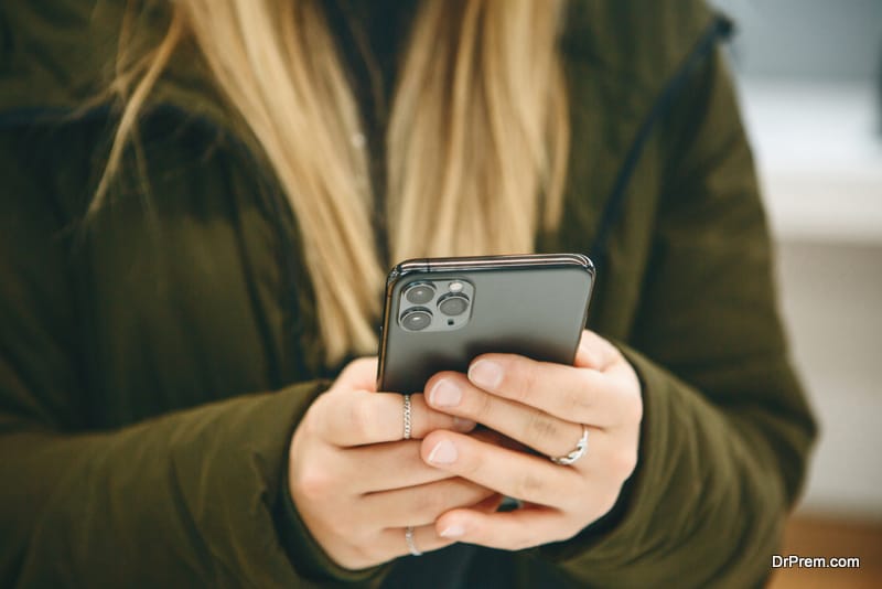 woman looking at the mobile