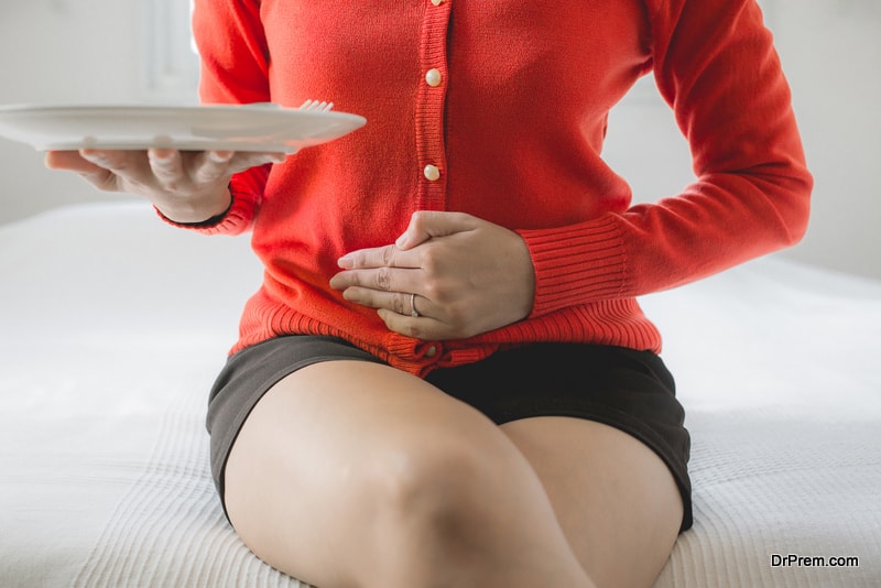Digestion problems,Woman with stomach pain after eating