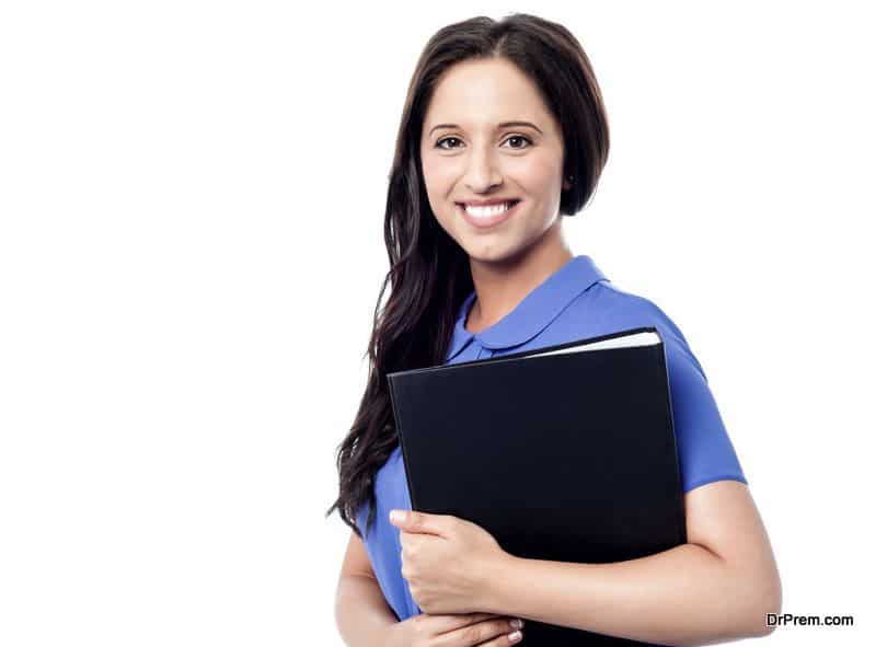 Happy young smiling woman with folder