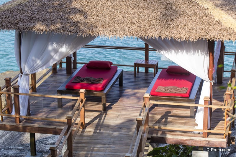 Massage table overlooking the sea. Spa massage room on the beach in island Koh Phangan, Thailand