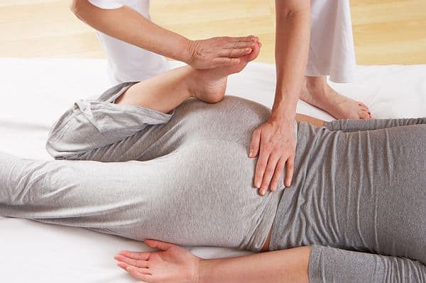 Woman having Shiatsu massage