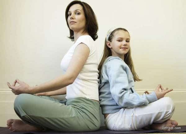mother-and-daughter-doing-yoga