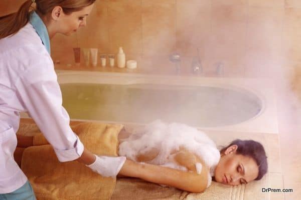 Young woman in hammam or turkish bath.