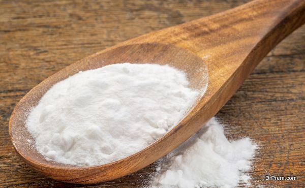 baking soda (Sodium bicarbonate) on a wooden spoon