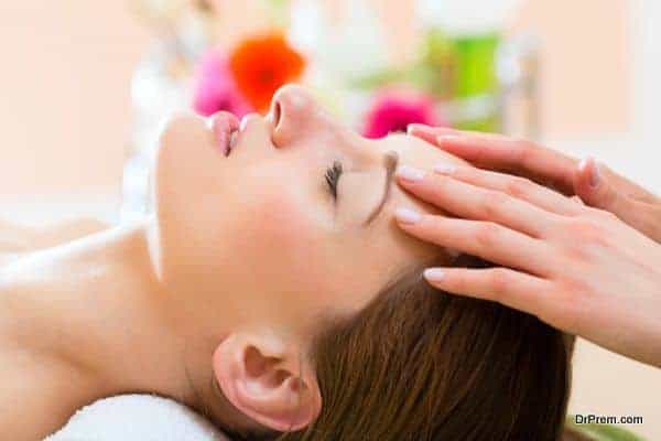 Wellness - woman getting head massage in Spa