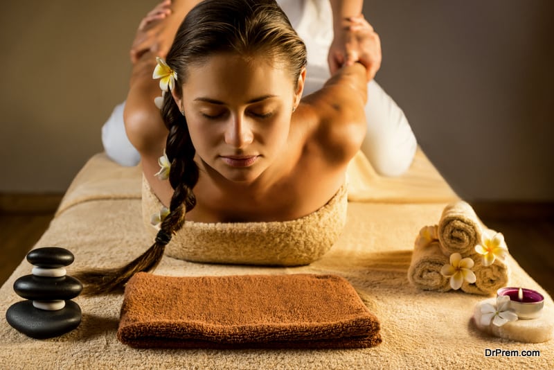 woman undergoing Thai massage therapy