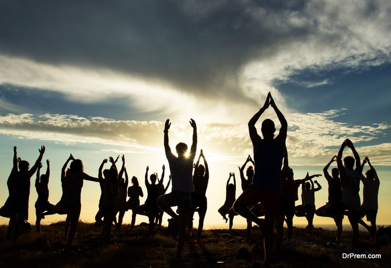 people-doing-yoga-in-Yoga-Festival