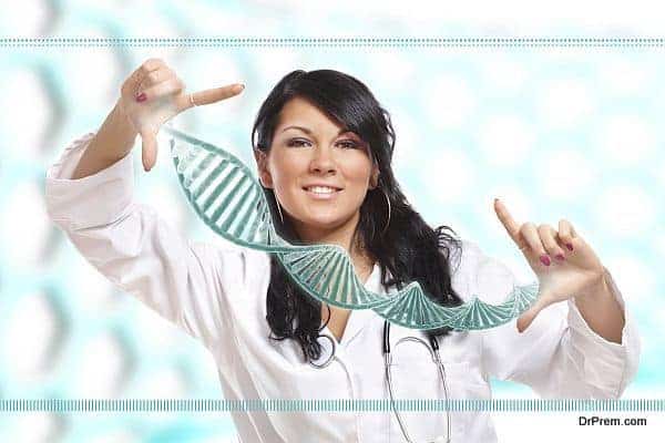 Researcher holding up a DNA strand in the laboratory