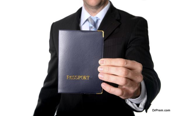 business man holding passport