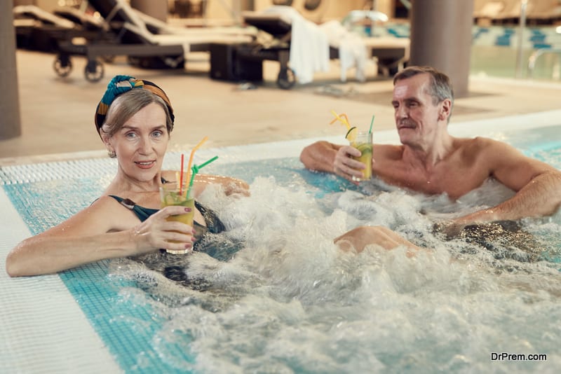 Modern Senior Couple Enjoying Hot Tub at Resort